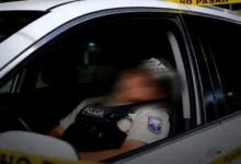 Policía hallado muerto con impactos de bala en un carro